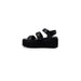 Elegant black platform sandal displayed for stylish and comfortable footwear fashion