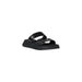 Black platform slide sandal showcasing a stylish and comfortable footwear option