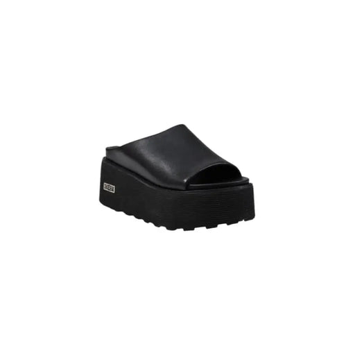 Black platform slide sandal for stylish and comfortable footwear