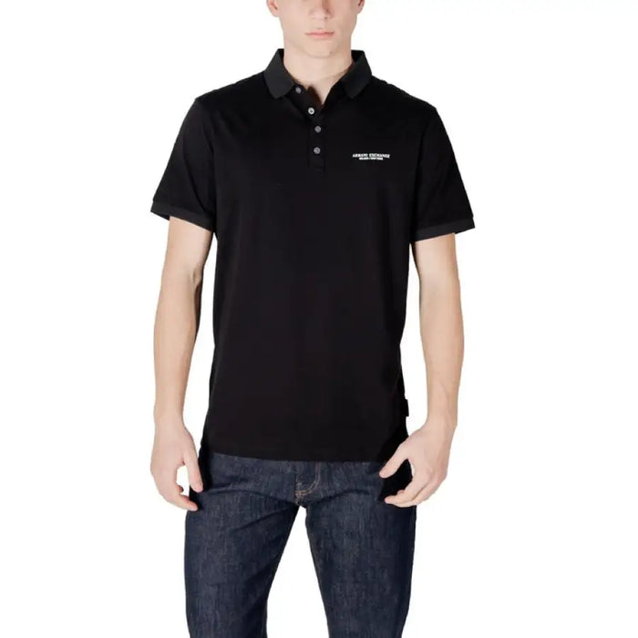Black polo shirt paired with dark wash jeans from Armani Exchange Men’s collection