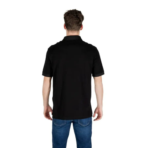 Armani Exchange Men’s Black Cotton Polo Shirt showcasing classic style and comfort