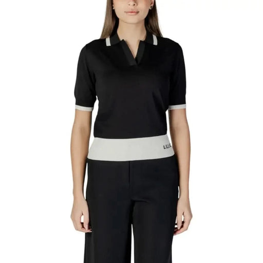Black Liu Jo Women’s V-Neck Polo T-Shirt with white trim on collar, sleeves, and waistband