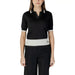 Black Liu Jo Women’s V-Neck Polo T-Shirt with white trim on collar, sleeves, and waistband