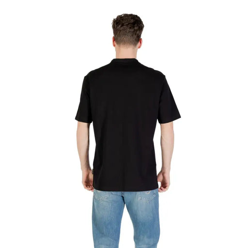 Black short sleeve polo shirt for men displayed on a mannequin