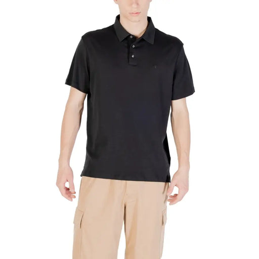Black short sleeve polo shirt displayed in a product image for men’s fashion