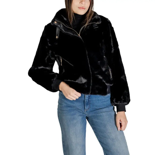 Black faux fur bomber jacket with hood and zipper closures in polyester designed as a blazer for women