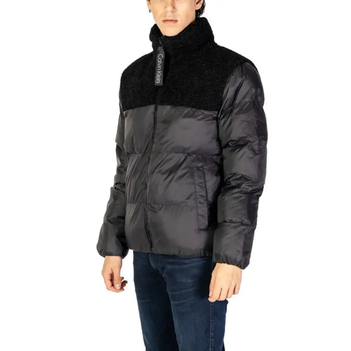 Black Puffer Jacket showcasing a stylish design and warm insulation for cold weather