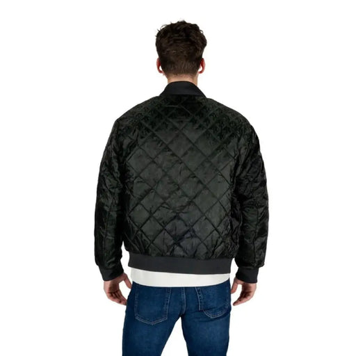 Black quilted bomber jacket showcasing stylish design and premium quality craftsmanship