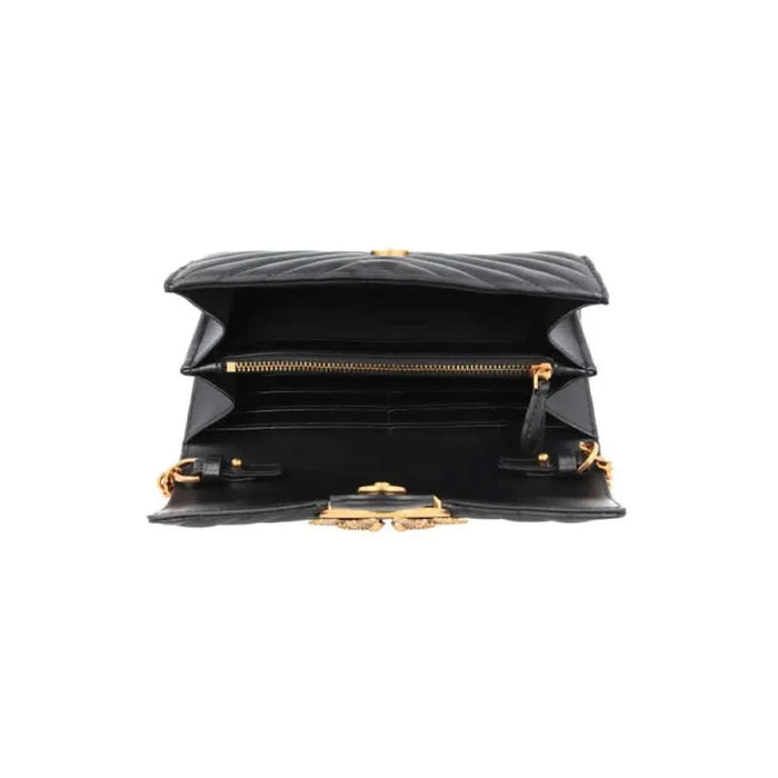 Black quilted leather handbag with gold hardware and multiple compartments by Pinko