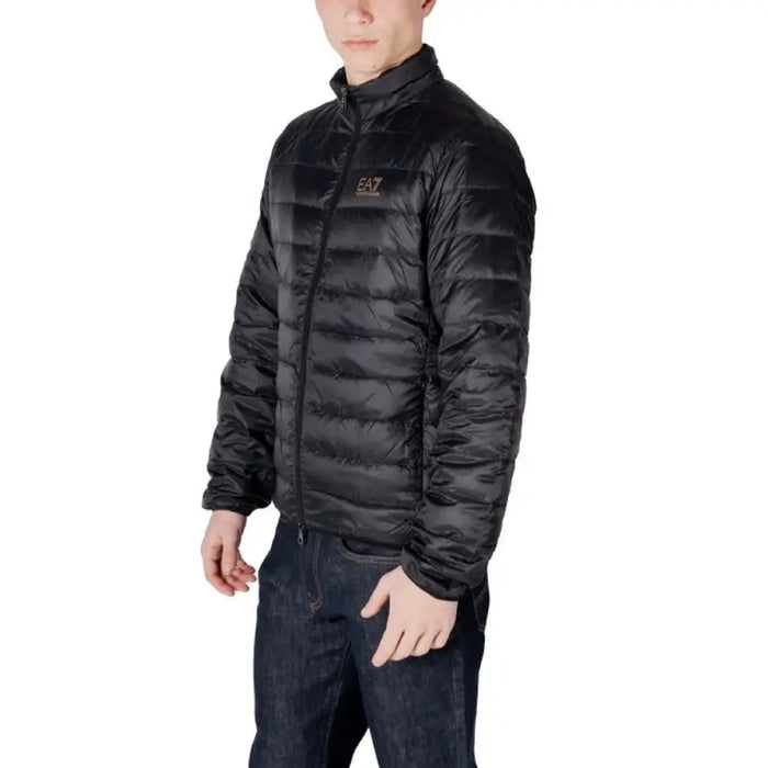 Black quilted puffer jacket featuring a stylish design and warm insulation for winter wear
