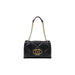 Cream quilted handbag with gold chain straps for stylish wear and elegance