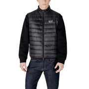 Black quilted puffer vest with knit sleeves zipper front and ea7 logo on the chest