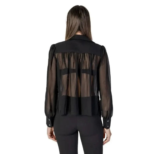 Black sheer blouse with long sleeves and solid collar from Morgan De Toi Women’s collection