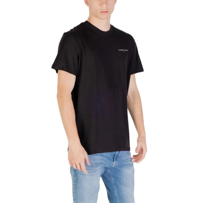 Black short-sleeve Tommy Jeans T shirt displayed in a product image
