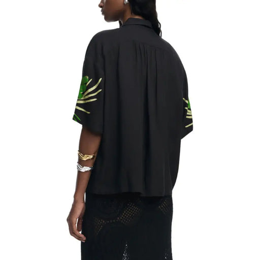 Black short-sleeved shirt with green and gold leaf floral print for Men