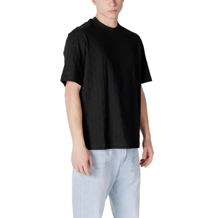 Black short-sleeved Armani Exchange Men’s cotton round neck T-shirt displayed