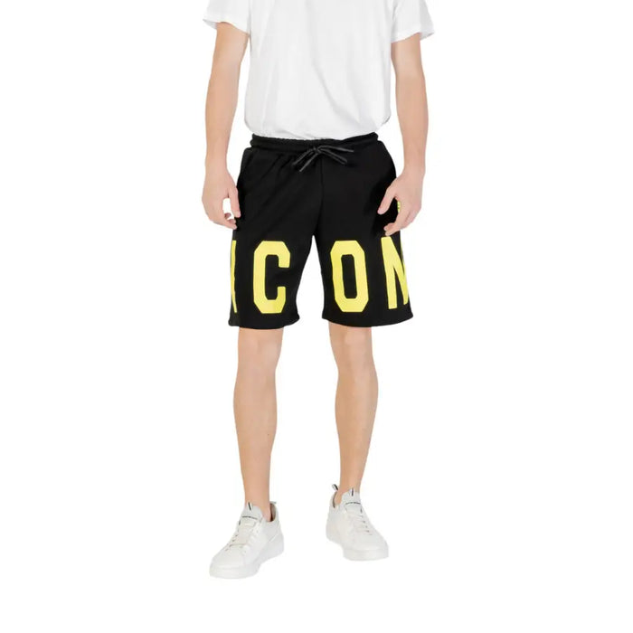 Black shorts with yellow ICON lettering displayed in White Shorts with ICON Print product image