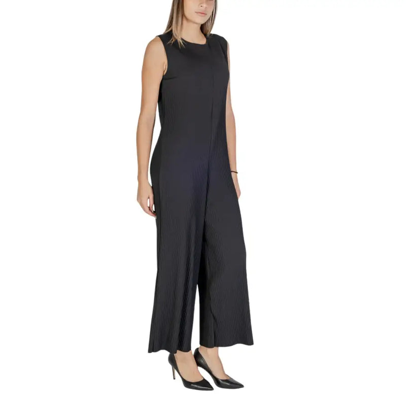 Black sleeveless polyester pleated jumpsuit with wide-leg pants round neckline and zipper closure front view
