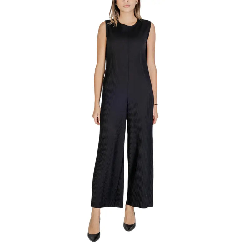 Black sleeveless polyester jumpsuit with pleated bodice wide-leg pants and zipper closure front view