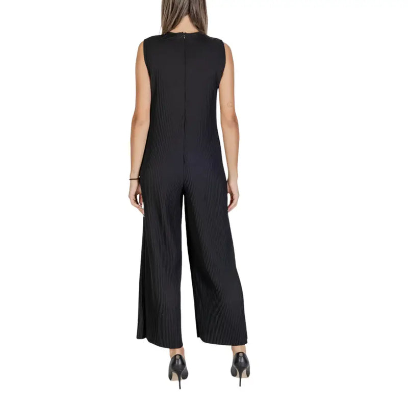 Black sleeveless polyester jumpsuit with zipper featuring pleated design and wide-leg pants for elegant wear