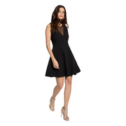 Black sleeveless dress by Morgan De Toi featuring a sheer mesh neckline and a flared skirt