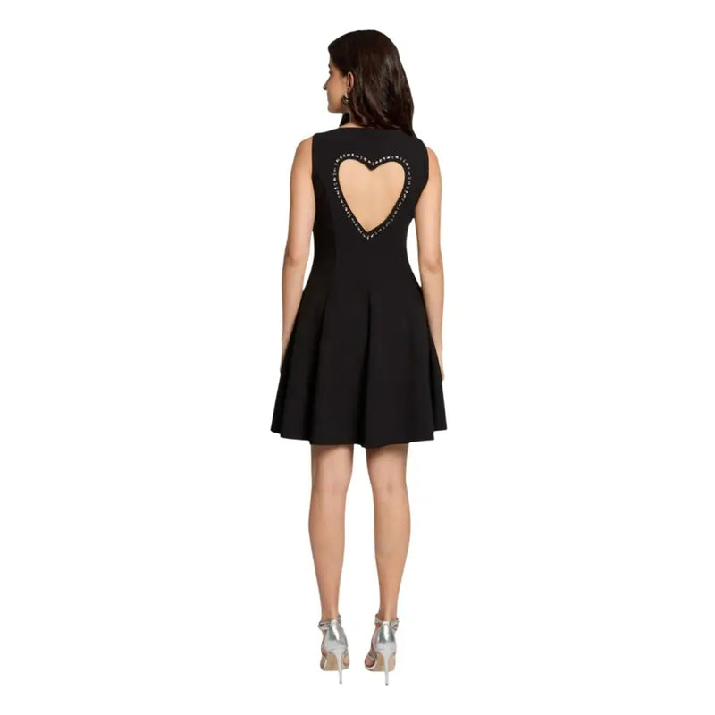 Black sleeveless round neck dress by Morgan De Toi with heart-shaped back cutout outlined in sparkling rhinestones