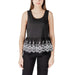Black sleeveless top with white embroidered trim featured in White Sleeveless Top with Black Floral Trim product