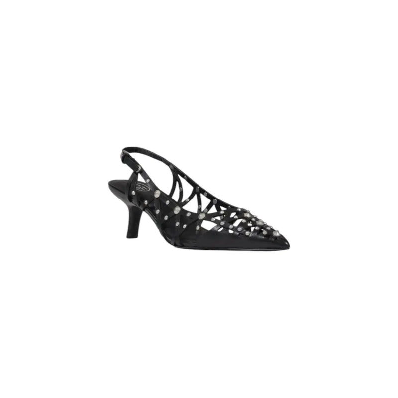 Black leather slingback pump with pointed toe, silver stud embellishments on crisscross straps and heel