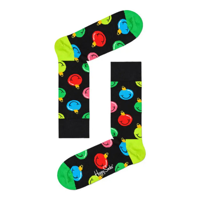 Black socks adorned with colorful smiley faces in a Gingerbread House box