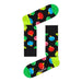 Black socks adorned with colorful smiley faces in a Gingerbread House box