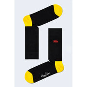 Black socks with yellow toes and heels featuring the Beatles logo for stylish wear