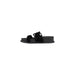 Black suede platform sandal displayed in the product listing