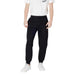 Black sweatpants paired with white sneakers, ideal for casual or athletic wear