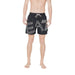 Black swim trunks featuring a prominent white logo for men’s beachwear