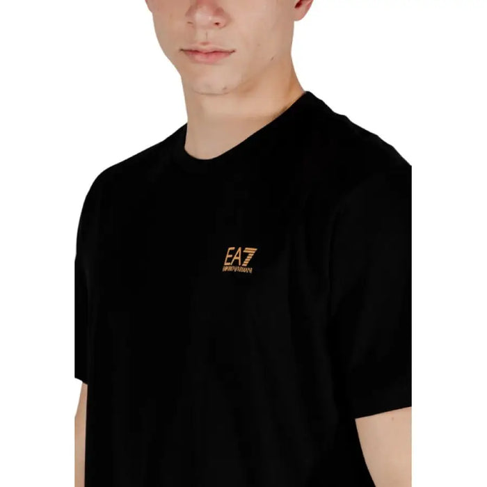 Black EA7 Men Round Neck Cotton T-shirt featuring a gold logo design