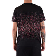 T-shirt noir à manches courtes orné de paillettes roses et argentées en dégradé des épaules à l'ourlet