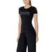 Black T shirt featuring rhinestone Guess logo for stylish casual wear