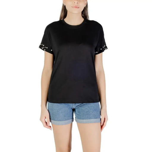 Black T shirt with studded sleeves displayed in the product named Black T Shirt With Studded Sleeves