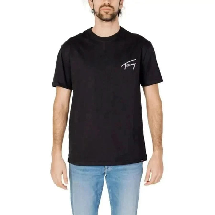 Black T-shirt with ’Tommy’ logo on chest from Tommy Hilfiger Jeans Men’s collection