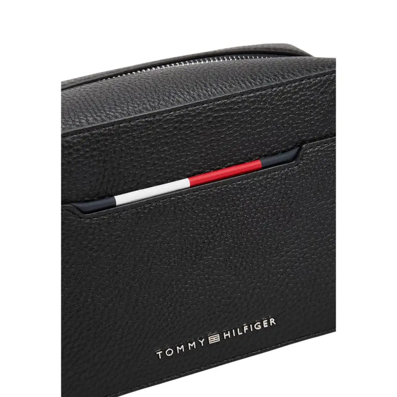 Black textured leather toiletries bag by Tommy Hilfiger for stylish storage