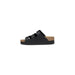 Black three-strap sandal showcasing a stylish and comfortable footwear option for women