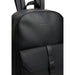 Black Tommy Hilfiger leather backpack displayed in a product showcase