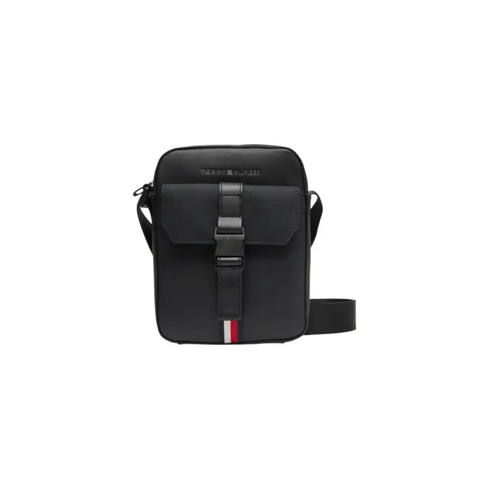 Black Tommy Hilfiger crossbody bag displayed with navy blue messenger bag in product image