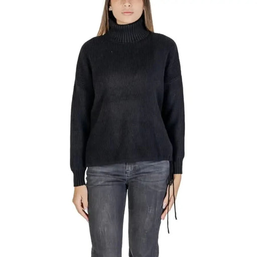 Black turtleneck sweater with side ties from Sandro Ferrone for women