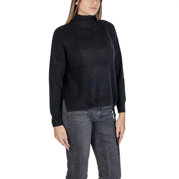 Sandro Ferrone Black Turtleneck Sweater for Women displayed on a white background