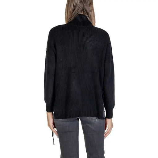 Black turtleneck sweater with side ties by Sandro Ferrone for women