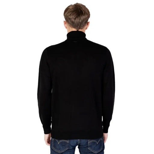 Black turtleneck sweater with abstract black and white pattern for stylish winter wear