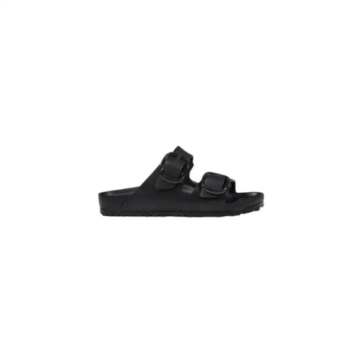 Black two-strap sandal displayed in a product image suitable for online footwear shopping