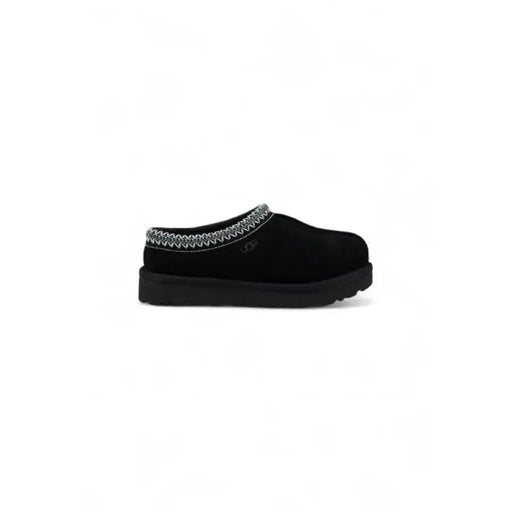 Black UGG Tasman slipper shown in product image of Brown UGG Slipper