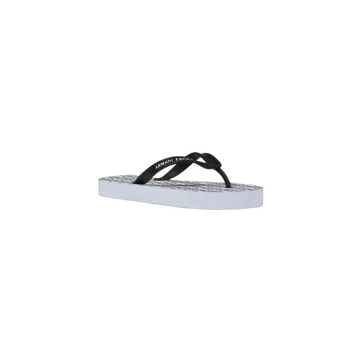 Black and white flip-flop displayed as part of the Black and White Flip Flop product